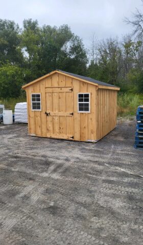 10ft x 12ft wood siding garden shed with a door in the middle and a small window on either side of the door