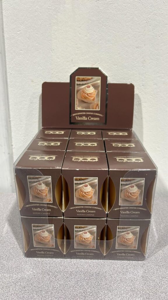Box of 18 Vanilla Cream Votive Candles - each is in a brown box with a picture of pancakes with whip cream on top of them