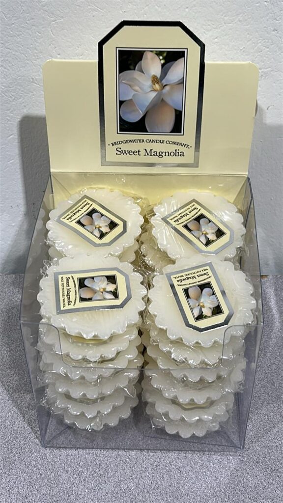 Box of white coloured wax melts - sweet magnolia scented - approximately 24 in the box