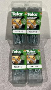 Picture of 4 packages of Teks . 12 x 2 1/2 inch screws that have a Socket wafer head . For attaching metal to wood .